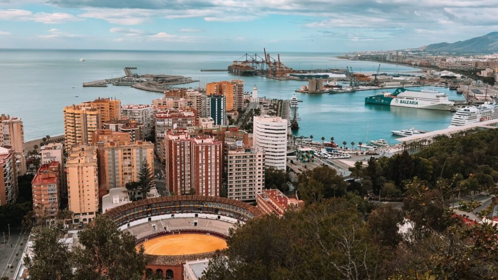 Excursion d'une Journée de Malaga à Tanger : Le Guide Complet 9 Panoramic view of Malaga port and city with ferries, departure point for Malaga to Tangier day trips